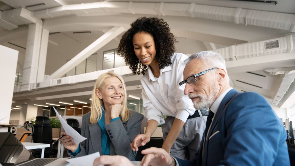 Financial advisors reviewing documents during secured lending loan approval process